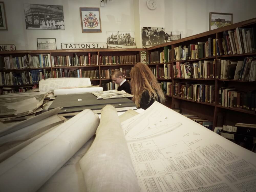 Child in Local History Library