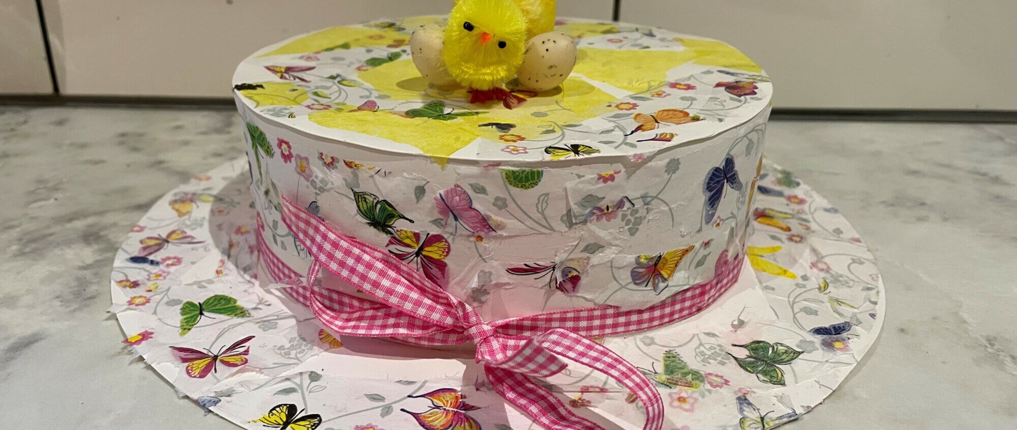 Hat decorated with butterfly paper Easter Chick