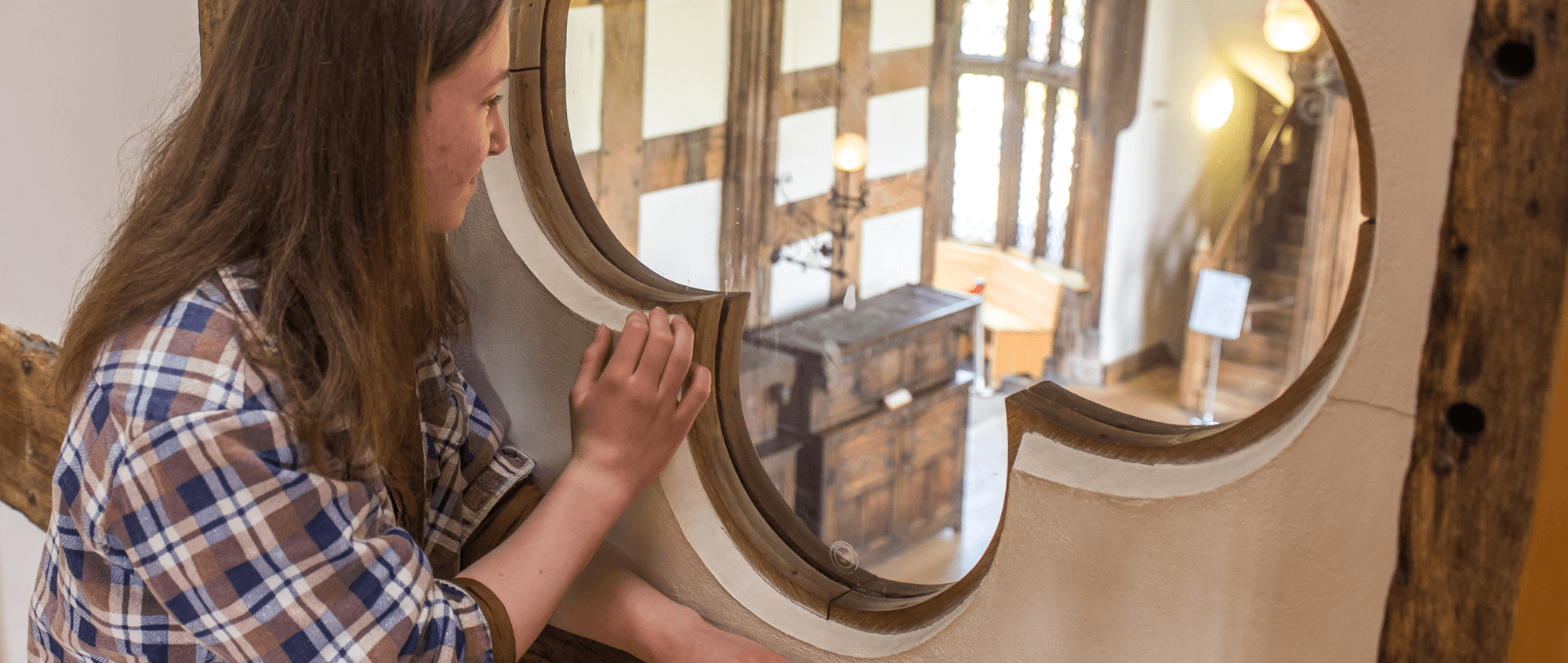 Girl looking out onto the Great Hall