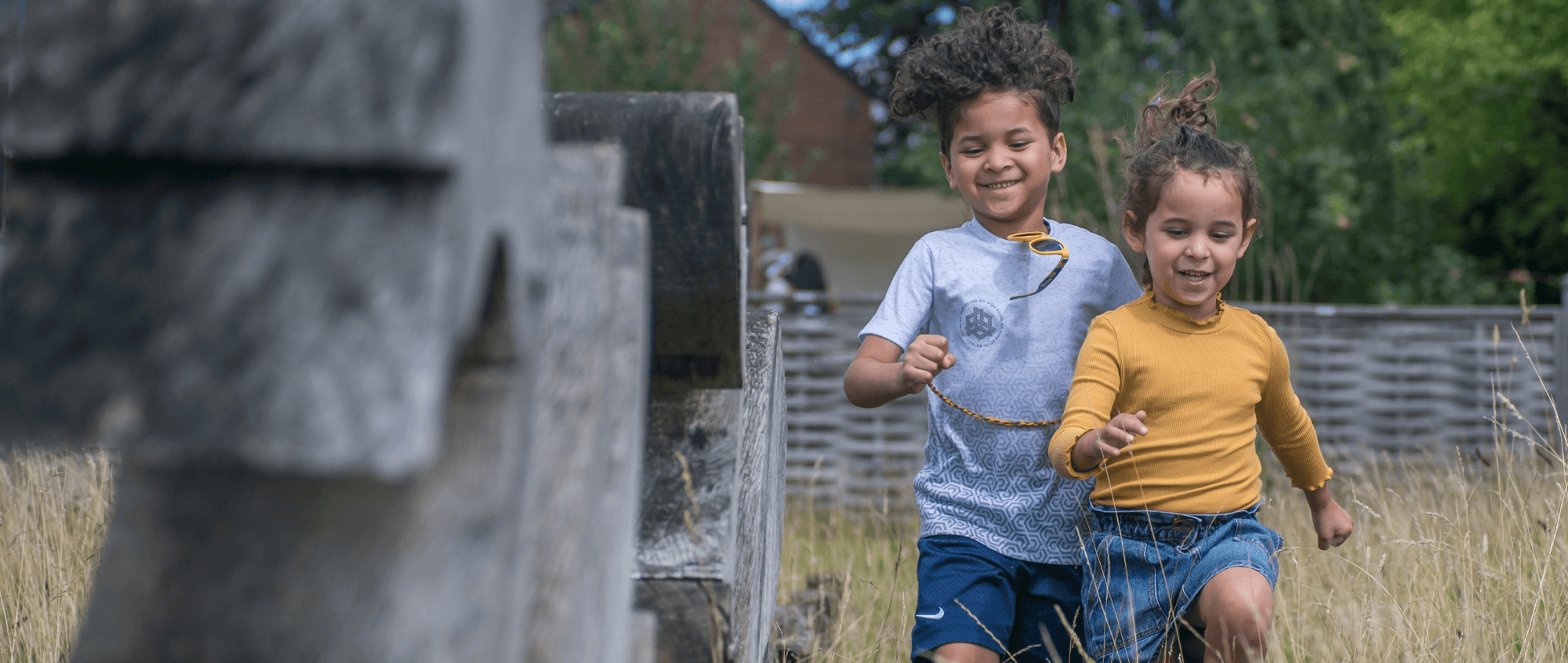Children running in the gardens at Ordsall Hall