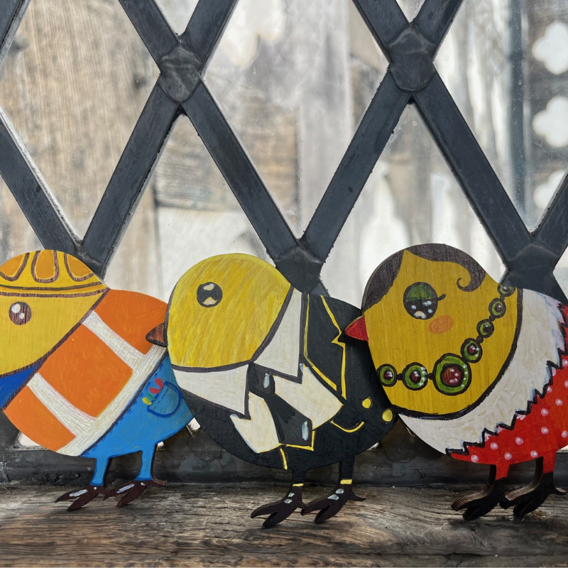 A row of three chicks