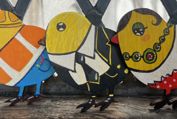 A row of three chicks