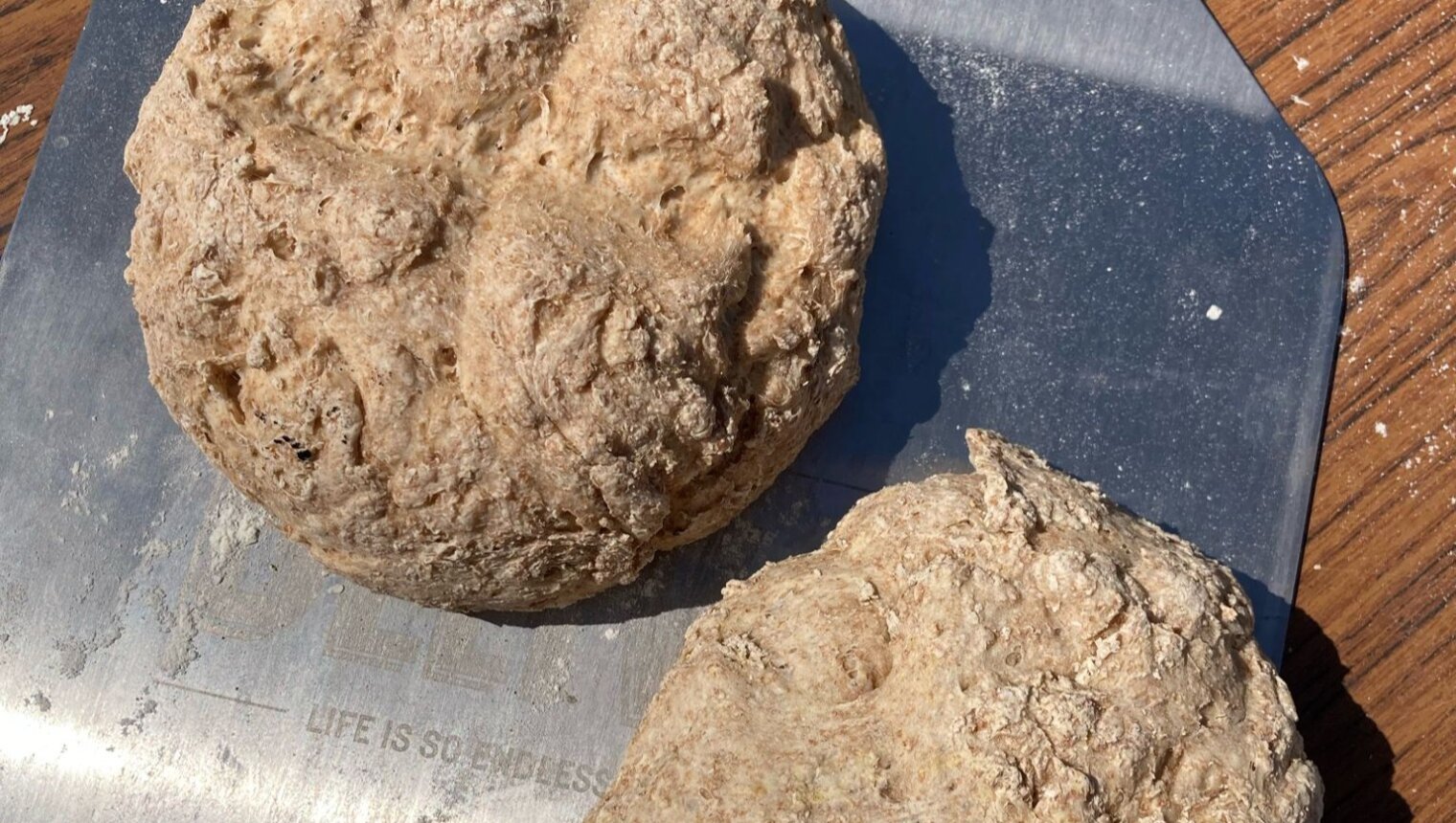 Two freshly baked rustic loaves