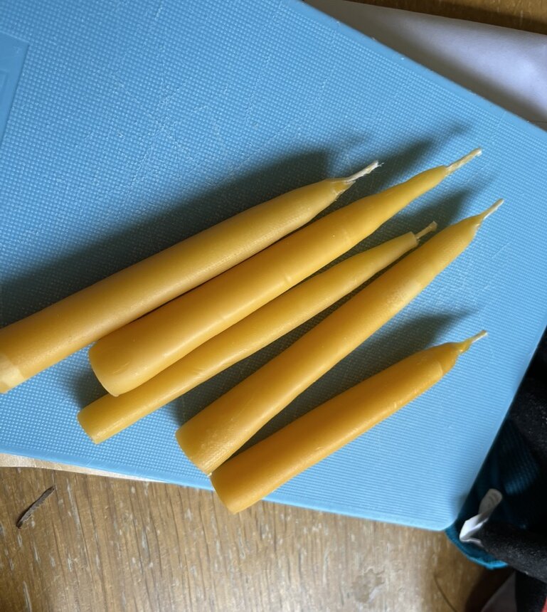 Making beeswax dipped candles